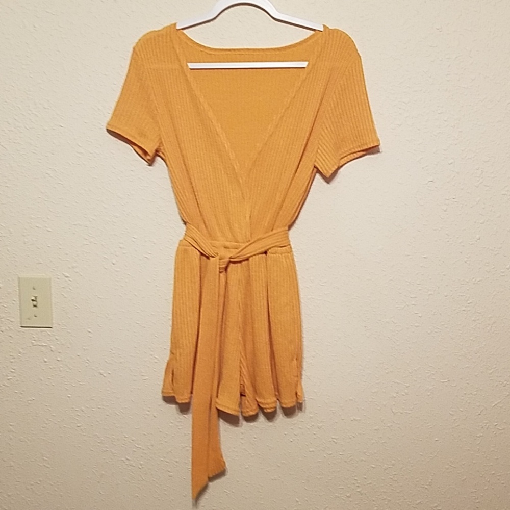 Sweater romper in mustard yellow